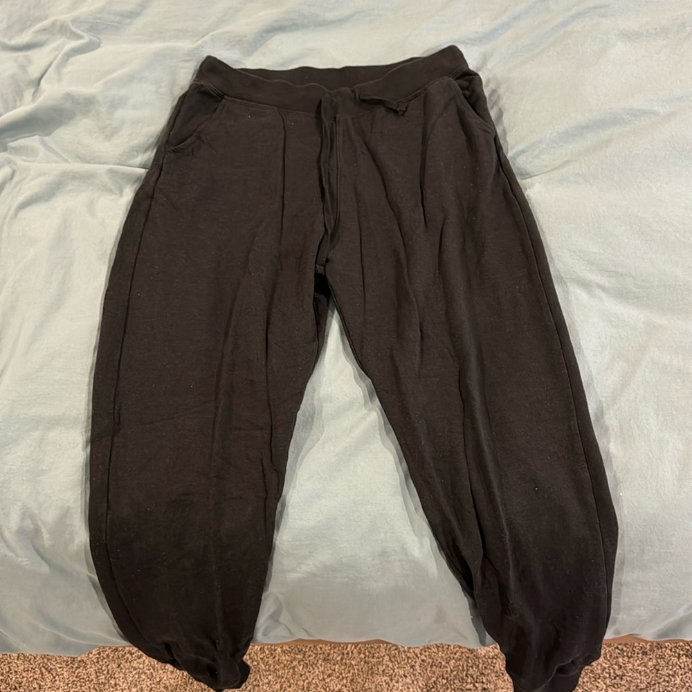 Black Nike sweater pant/yoga pants lightweight, soft and stretchy. Jogger style